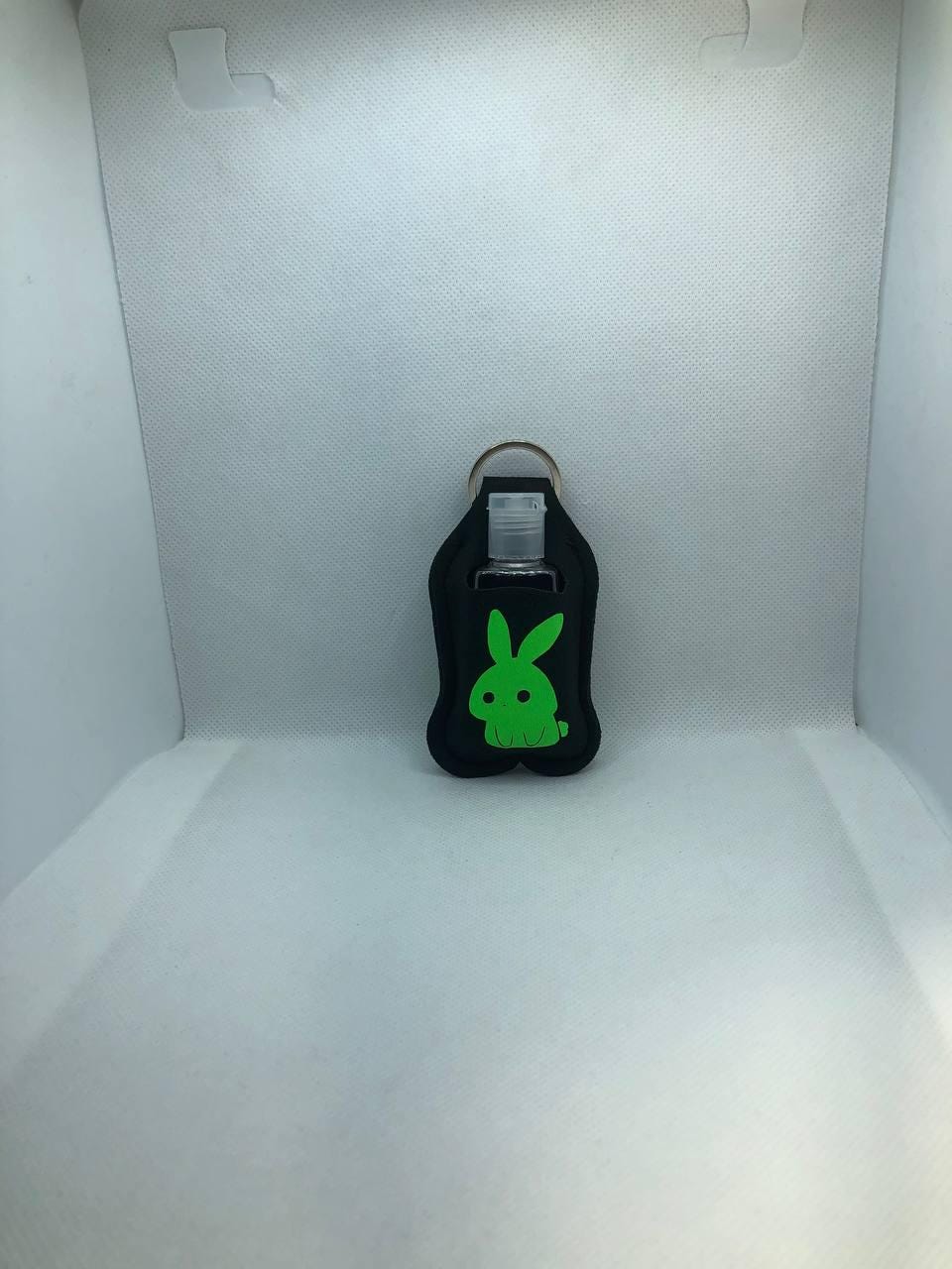 Black Glow In The Dark Bunny with "Forever Haunted" and a Skull Hand Sanitizer Keychain/Lotion Keychain/Sunscreen