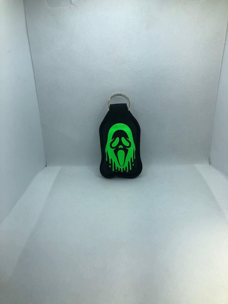 Black Glow In The Dark Scary Movie Ghostface with bloody knife Hand Sanitizer Keychain/Lotion Keychain/Sunscreen