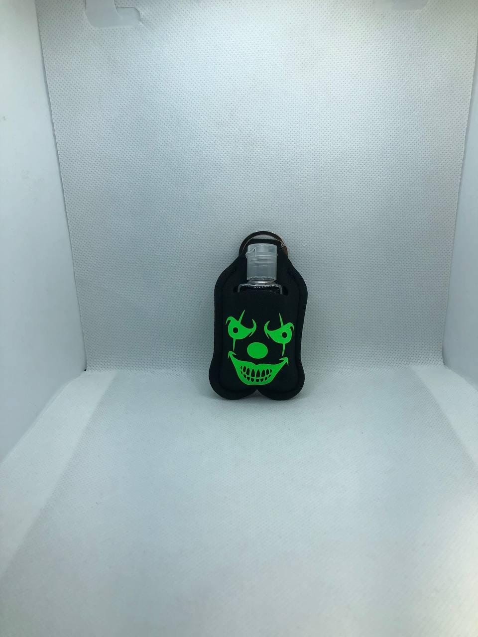 Black Glow In The Dark Clown face with "Living With My Demons" Hand Sanitizer Keychain/Lotion Keychain/Sunscreen Keychain