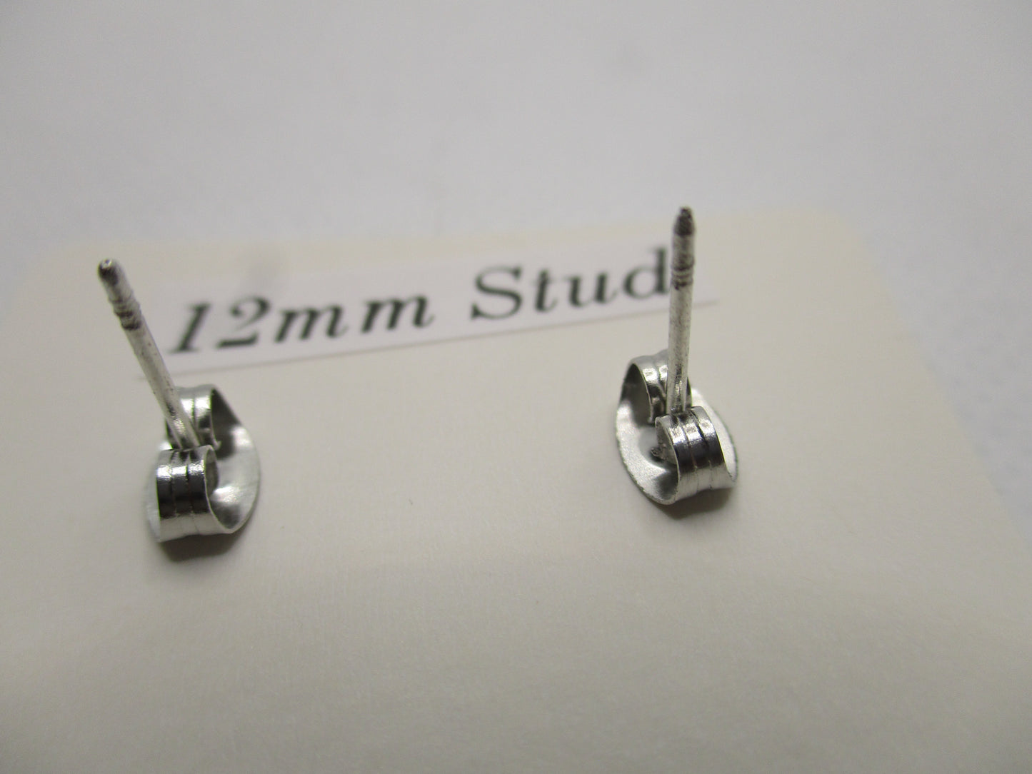 12MM Hypoallergenic Stainless-Steel Small Magenta Flower With Some Glitter Stud Earrings (Not a real dried flower)