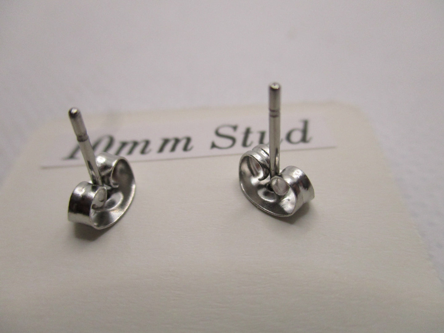 10MM Hypoallergenic Stainless-Steel Small Purple Flower With Some Glitter Stud Earrings (Not a real dried flower)