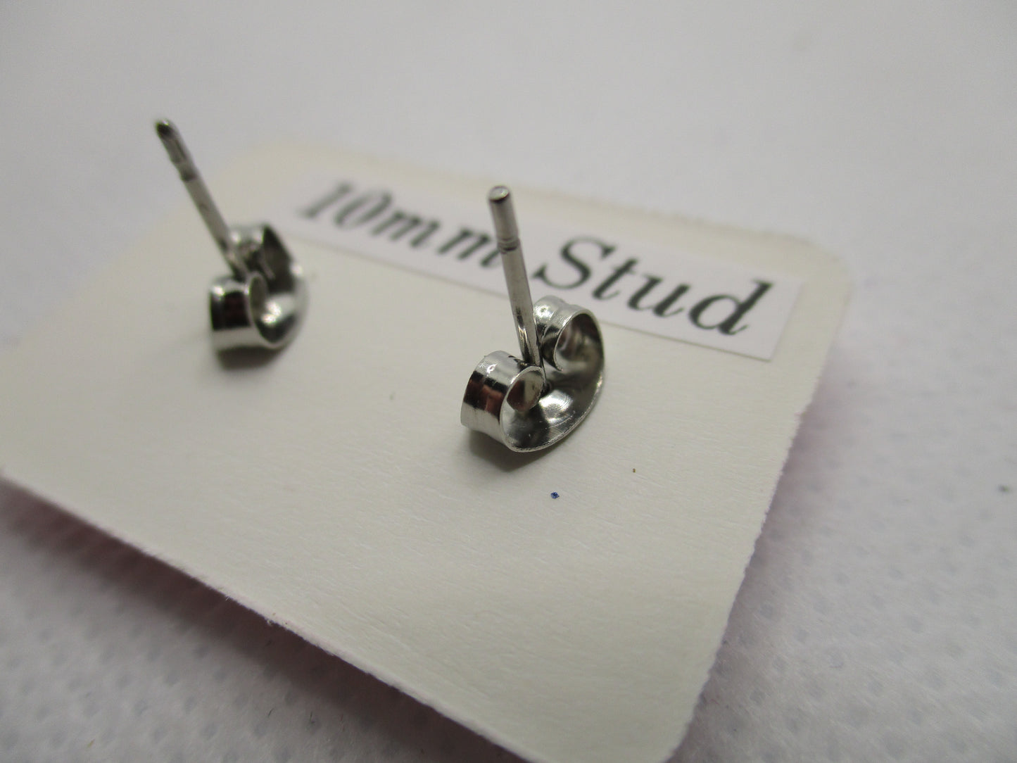 10MM Hypoallergenic Stainless-Steel Small Pink Butterfly With Some Glitter Stud Earrings (Not a real dried flower)