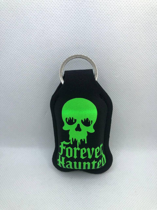 Black Glow In The Dark Bunny with "Forever Haunted" and a Skull Hand Sanitizer Keychain/Lotion Keychain/Sunscreen