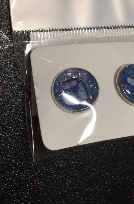 12MM Butterfly Earrings - Light Blue Butterfly With Blue Glitter background