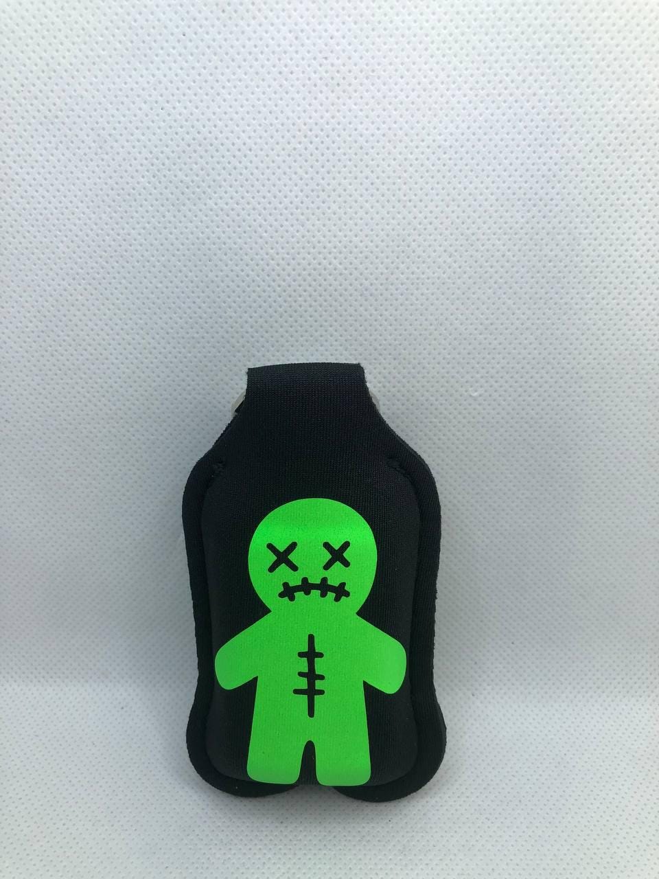 Black Glow In The Dark bow with a skeleton and Voodoo Doll Hand Sanitizer Keychain/Lotion Keychain/Sunscreen Keychain