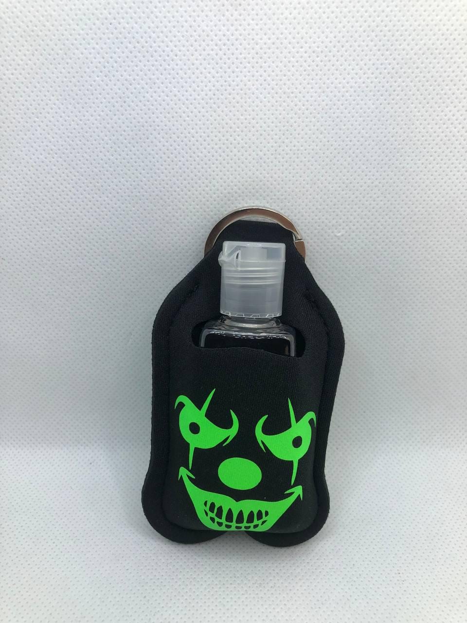 Black Glow In The Dark Clown face with "Living With My Demons" Hand Sanitizer Keychain/Lotion Keychain/Sunscreen Keychain