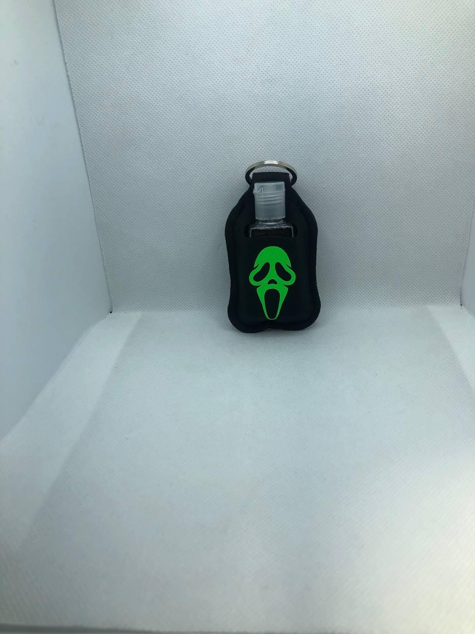 Black Glow In The Dark Scary Movie Ghostface with "Wazzzuuuup" Hand Sanitizer Keychain/Lotion Keychain/Sunscreen