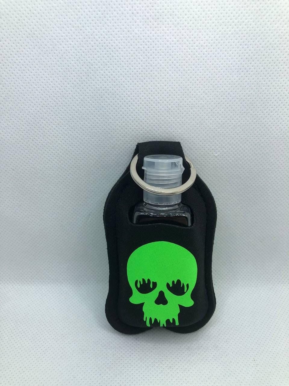 Black Glow In The Dark Melting Skull with "Cute but dead inside" Hand Sanitizer Keychain/Lotion Keychain/Sunscreen Keychain