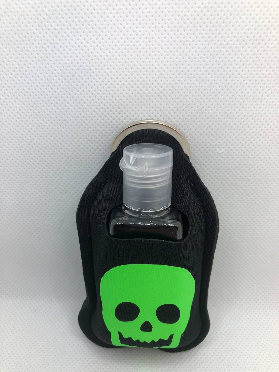 Black Glow In The Dark skull with "Trust No One" Hand Sanitizer Keychain/Lotion Keychain/Sunscreen
