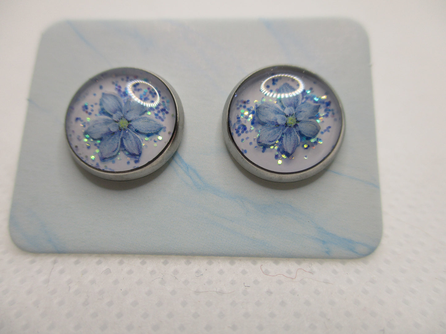 10MM Hypoallergenic Stainless-Steel Small Blue Flower With Some Glitter Stud Earrings (Not a real dried flower)