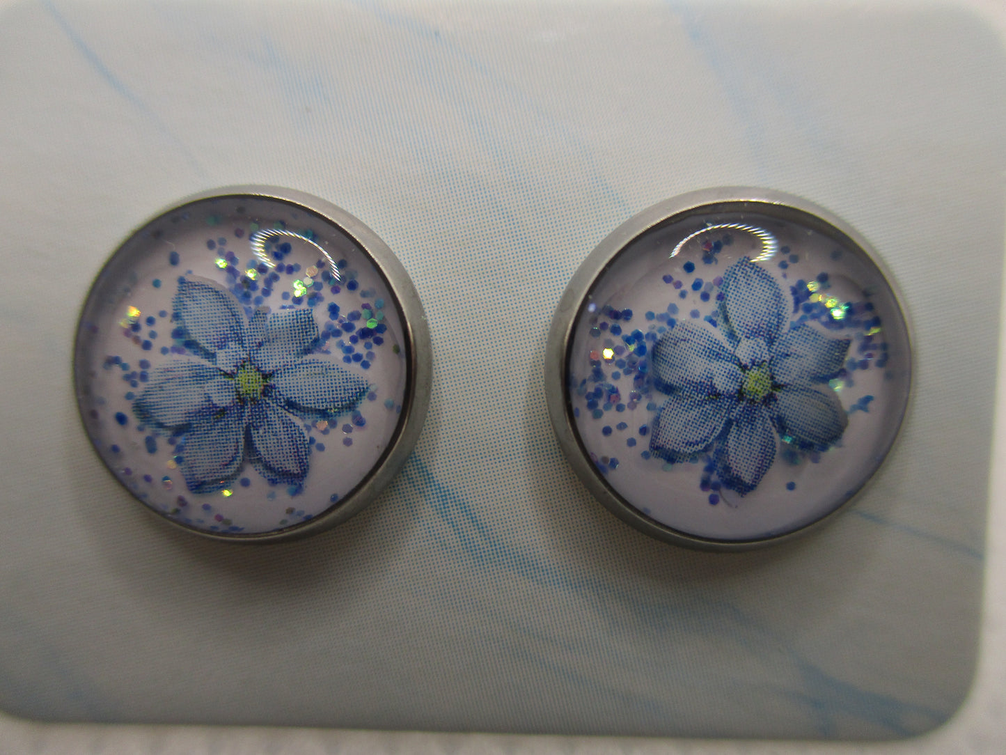10MM Hypoallergenic Stainless-Steel Small Blue Flower With Some Glitter Stud Earrings (Not a real dried flower)