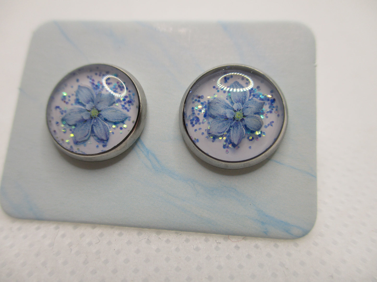 10MM Hypoallergenic Stainless-Steel Small Blue Flower With Some Glitter Stud Earrings (Not a real dried flower)