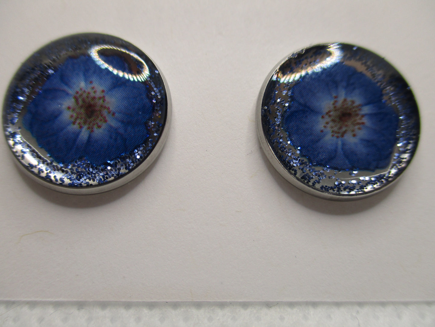 14MM Hypoallergenic Stainless-Steel Small Blue Flower With Some Glitter Stud Earrings (Not a real dried flower)
