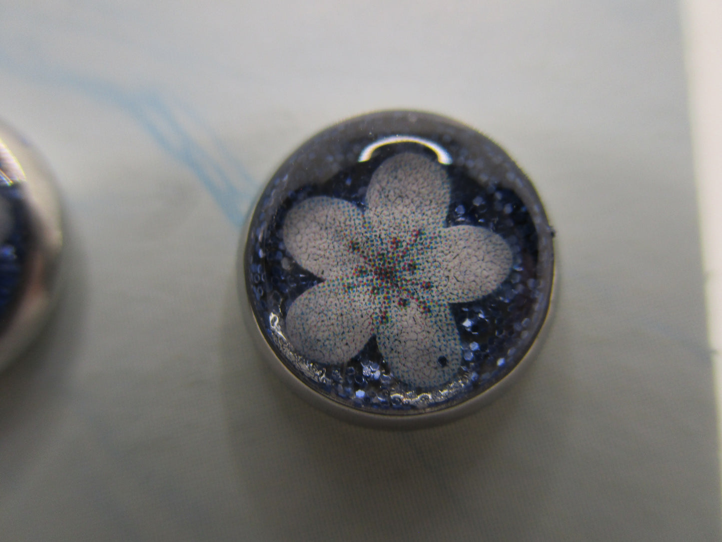 8MM Hypoallergenic Stainless-Steel Small Blue Flower With Some Glitter Stud Earrings (Not a real dried flower)