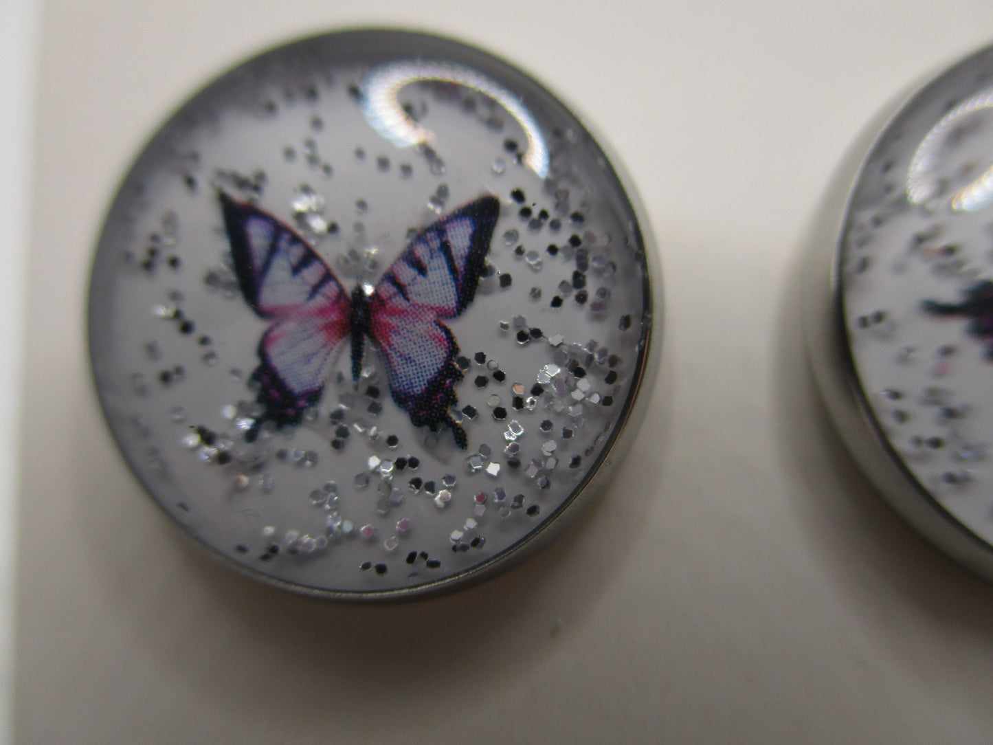 14MM Hypoallergenic Stainless-Steel Small Purple Butterfly With Some Glitter Stud Earrings (Not a real butterfly)