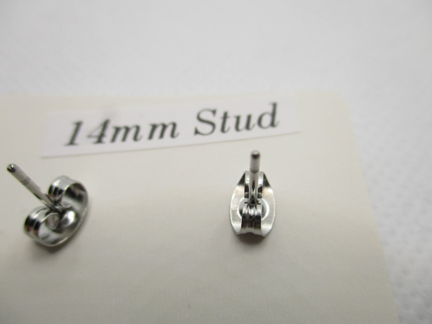 14MM Hypoallergenic Stainless-Steel Small Purple Butterfly With Some Glitter Stud Earrings (Not a real butterfly)
