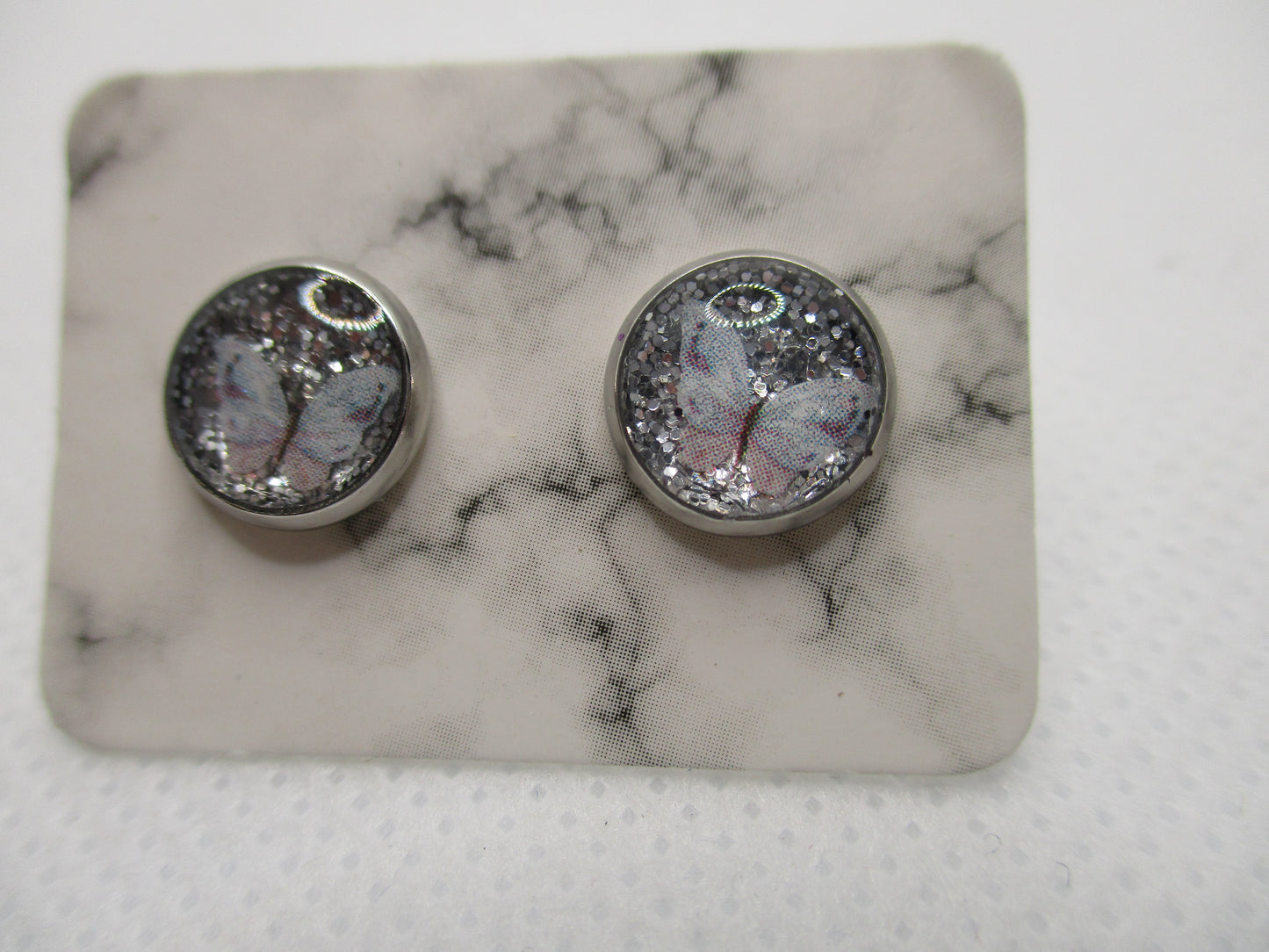 8MM Hypoallergenic Stainless-Steel Small Pink and White Butterfly With Some Glitter Stud Earrings (Not a real dried flower)