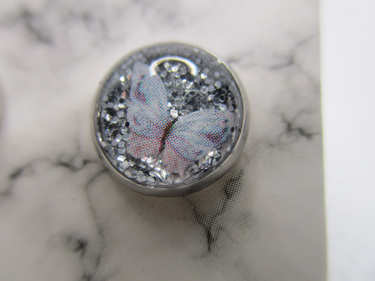 8MM Hypoallergenic Stainless-Steel Small Pink and White Butterfly With Some Glitter Stud Earrings (Not a real dried flower)