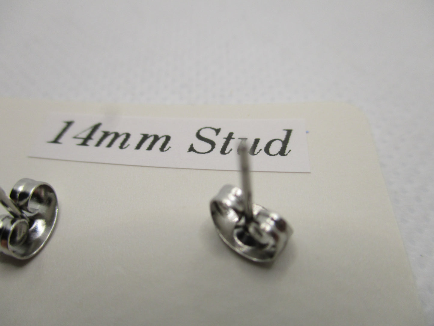 14MM Hypoallergenic Stainless-Steel Small Blue Flower With Some Glitter Stud Earrings (Not a real dried flower)