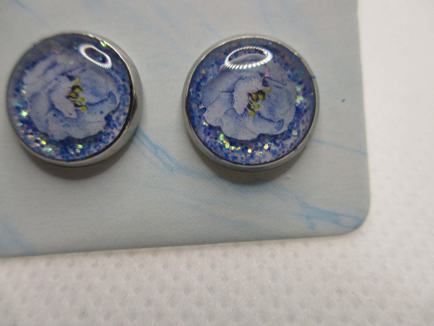 10MM Hypoallergenic Stainless-Steel Small Blue Flower With Some Glitter Stud Earrings (Not a real dried flower)