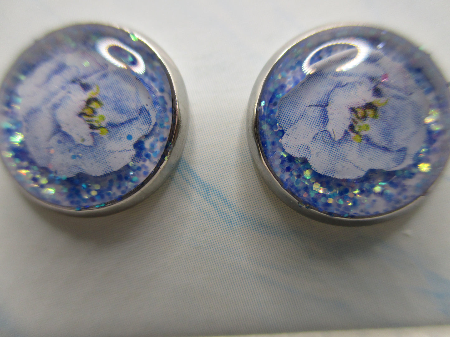 10MM Hypoallergenic Stainless-Steel Small Blue Flower With Some Glitter Stud Earrings (Not a real dried flower)