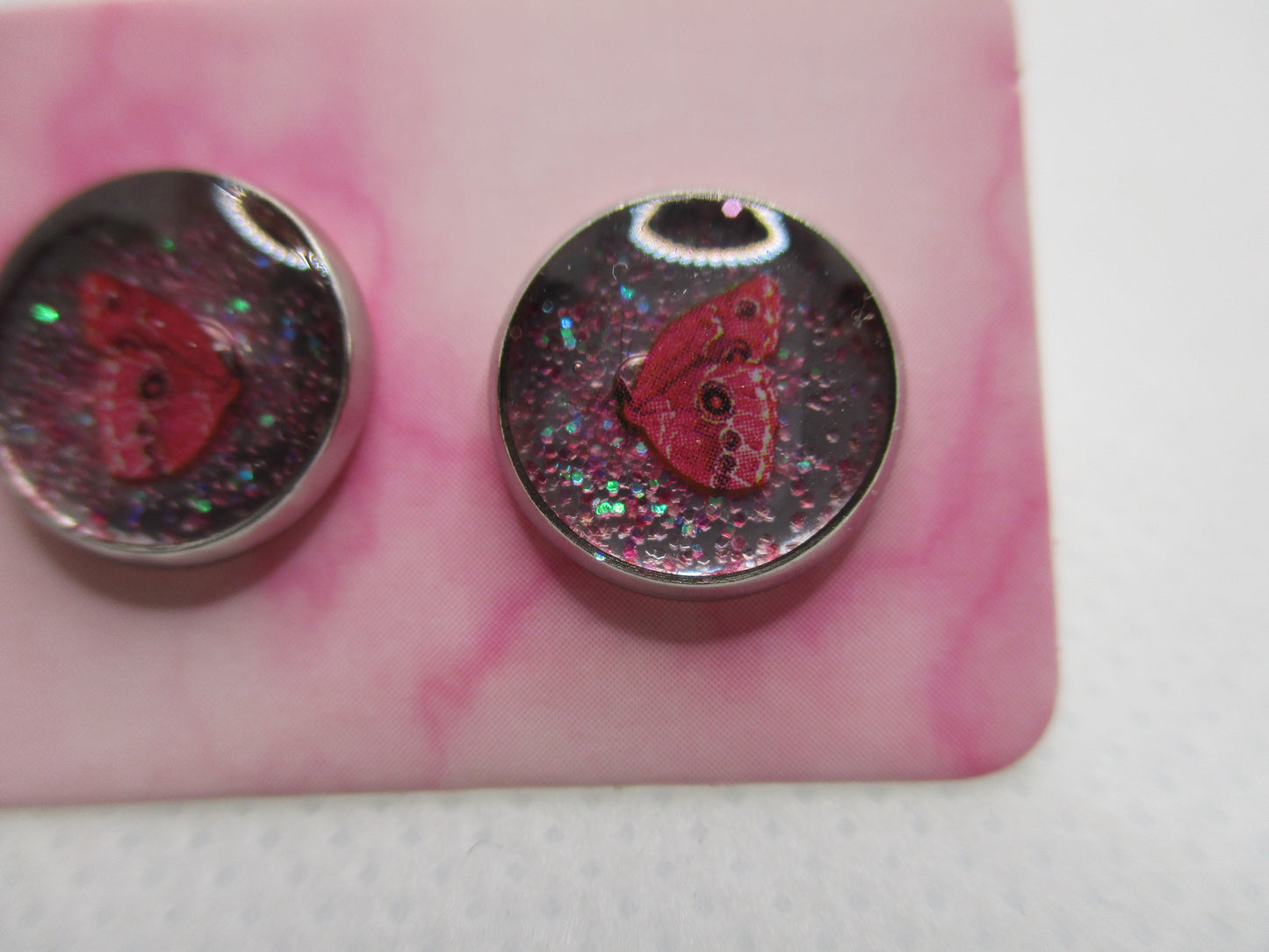 10MM Hypoallergenic Stainless-Steel Small Bright Pink Butterfly With Some Glitter Stud Earrings (Not a real butterfly)