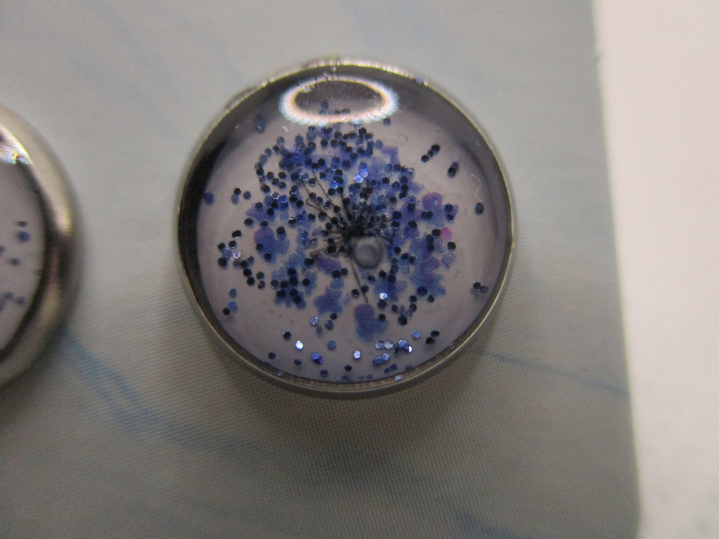 10MM Hypoallergenic Stainless-Steel Small Blue Flower With Some Glitter Stud Earrings (Not a real dried flower)