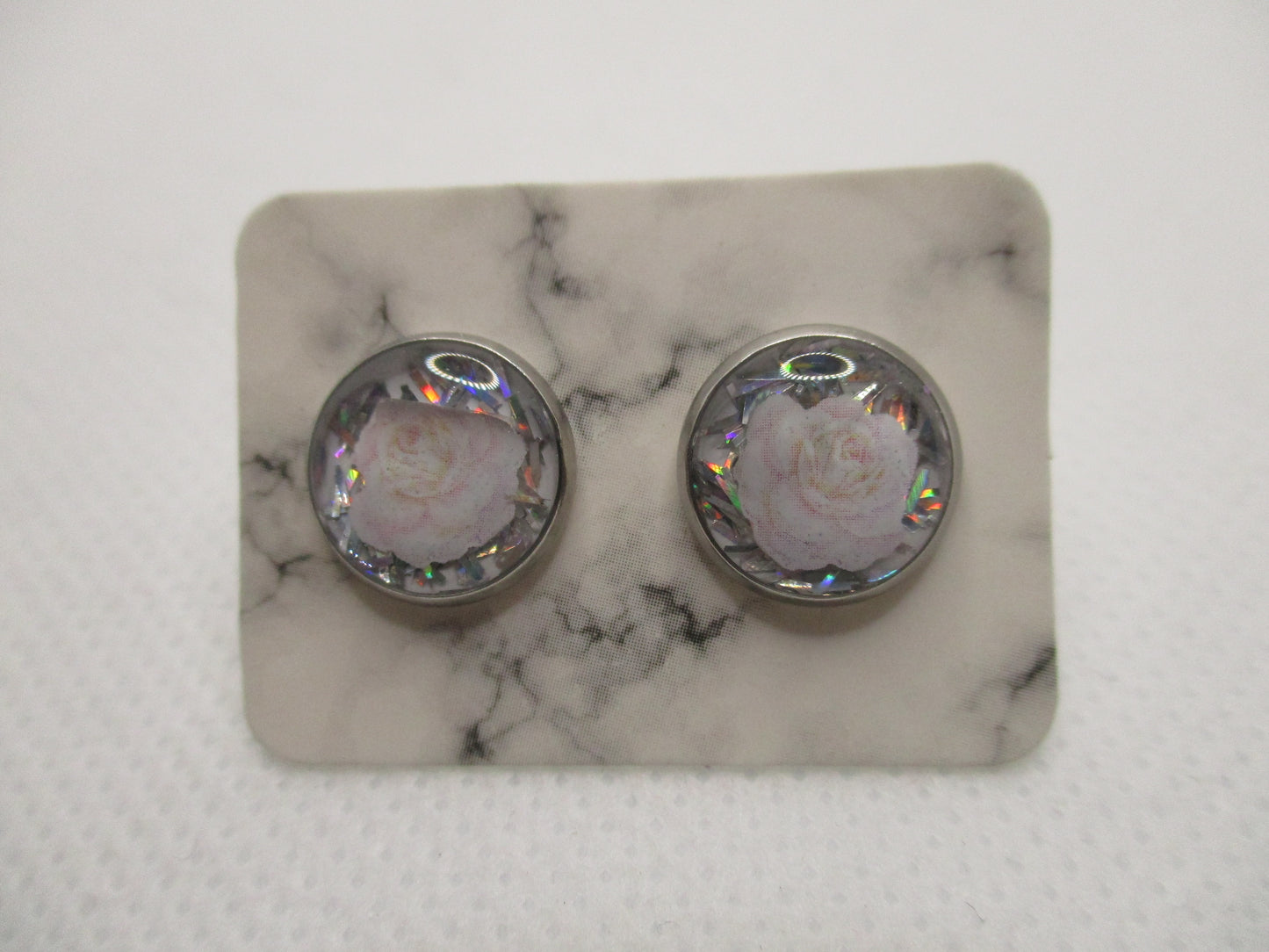 10MM Hypoallergenic Stainless-Steel Small Light Pink Flower With Some Glitter Stud Earrings (Not a real dried flower)